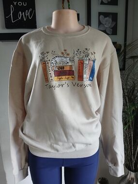 Jerzees Cream Sweatshirt with Colorful Book Graphic